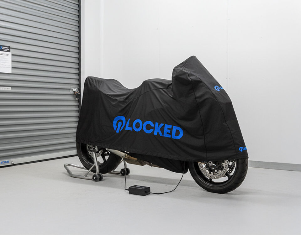 Motorbike storage in Alloa in a secure unit at Locked Self Storage Alloa, protected with a custom cover and trickle charger for safe winter storage.